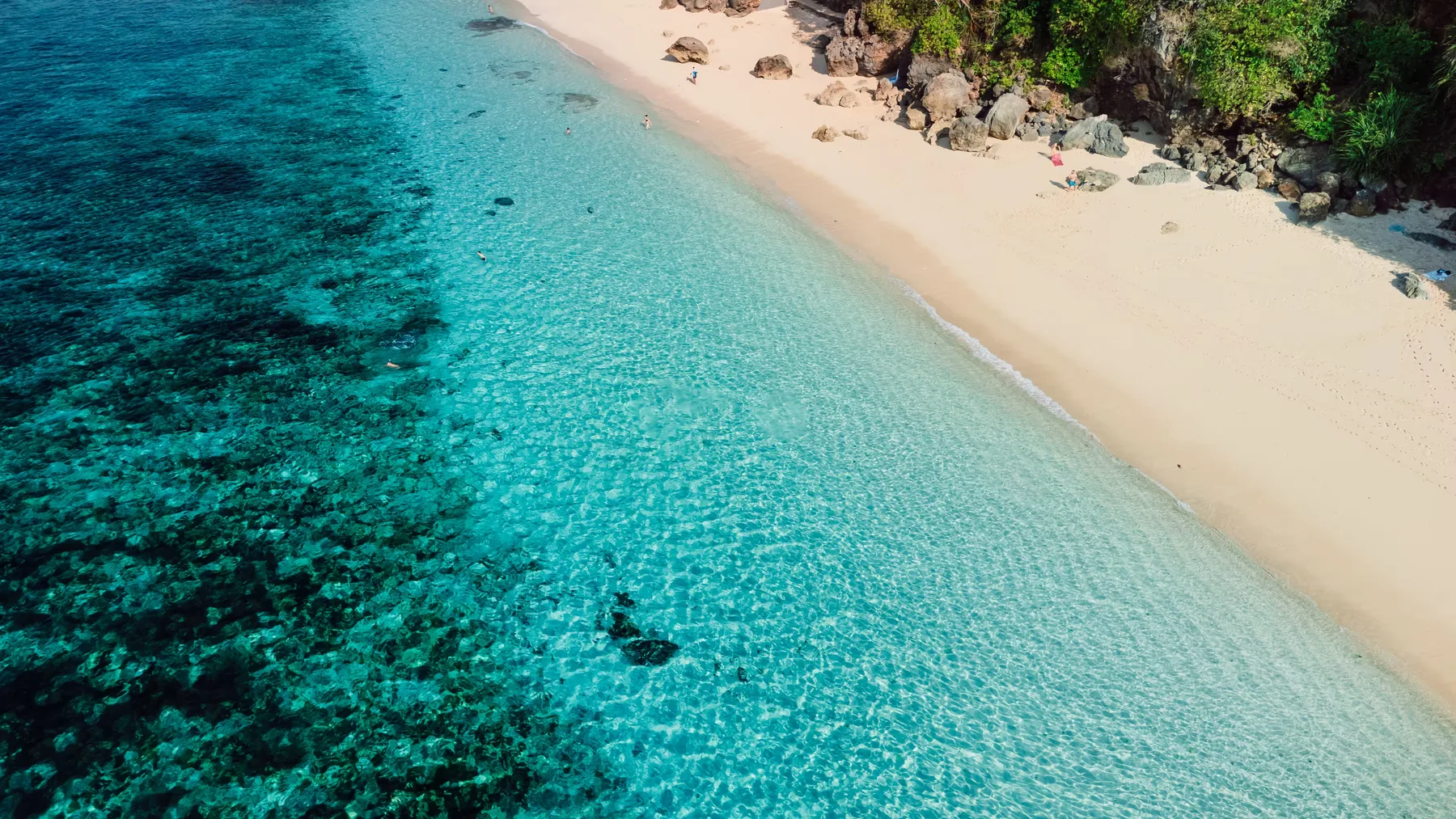 Aerial view of a white-sand beach on the Bukit Peninsula, Bali